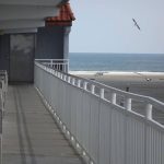 Beach view from hotel suite balcony at Days Inn and Suites Wildwood